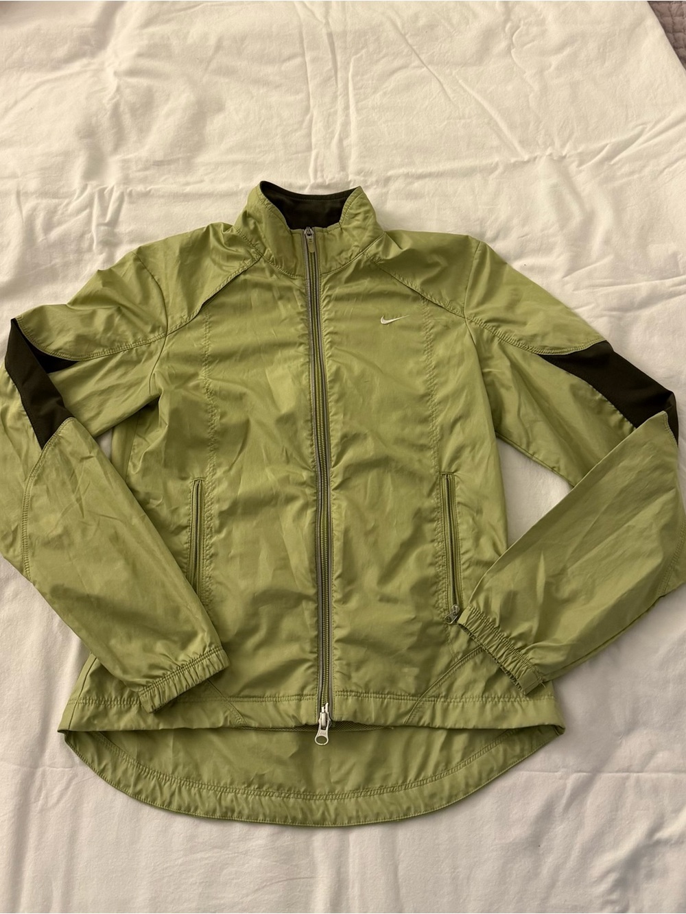 Vintage Nike sage green windbreaker jacket with black accents on sleeves XS